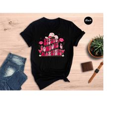 kisses cowboys martinis shirt,rodeo season shirt,v-day shirt,cowboy shirt,cowgirl