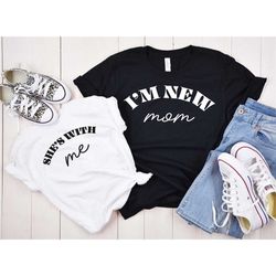 i'm a new mom - she's with me - 1st mother's day shirts - matching bodysuit and shirt - our first mother's day shirts -