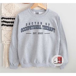 customized doctor of occupational therapy sweatshirt, dr. of occupational therapy est. 2023, otd graduation, occupationa
