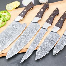custom or handmade damascus chef knife set. beautifully designed and easy to grip, comes with leather sheath.