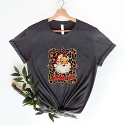 believe brown leopard santa claus shirt, family 2023 fashion party cute christmas tee, men and womens him gifted for h