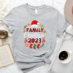 family christmas 2023 red hat gift shirt, funny christmas stocking tshirt, christmas family vacation squad shirt mockup