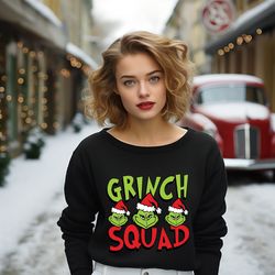 cute and comfy grinch squad sweatshirt,perfect for festive holiday fun,get in the holiday spirit with our grinch squad ,