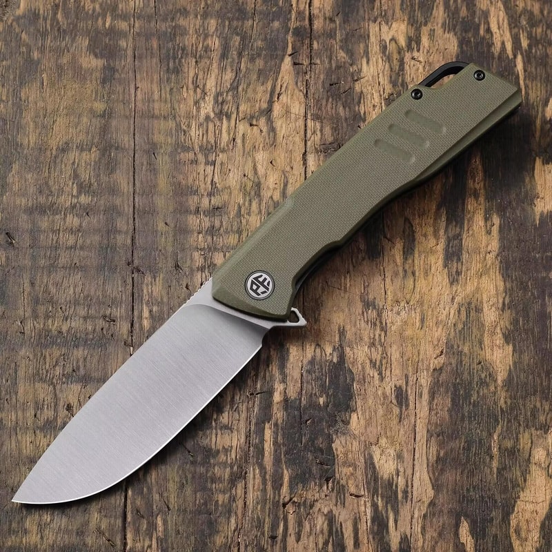 Petrified Fish Steel Folding Knife With Grip 1