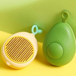Lemon-shaped brush for combing dog and cat hair