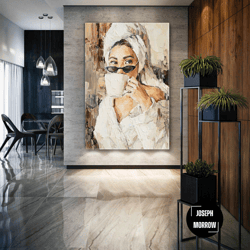 model with glasses drinking coffee while wearing a towel roll up canvas, stretched canvas art, framed wall art painting