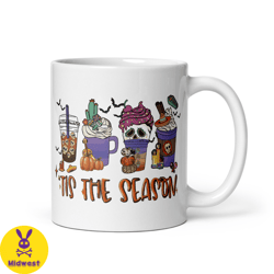 halloween coffee mug,funny skulls and pumpkin designs,spooky mug,ceramic coffee cup,scary and fun mug,ghoulish fun, holi