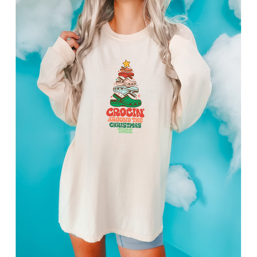 Crocin' Around The Christmas Tree Comfort Colors Sweatshirt, Crocs Christmas Tree Shirt, Trendy Christmas, Funny Christmas hoodie, crocs tee.jpg