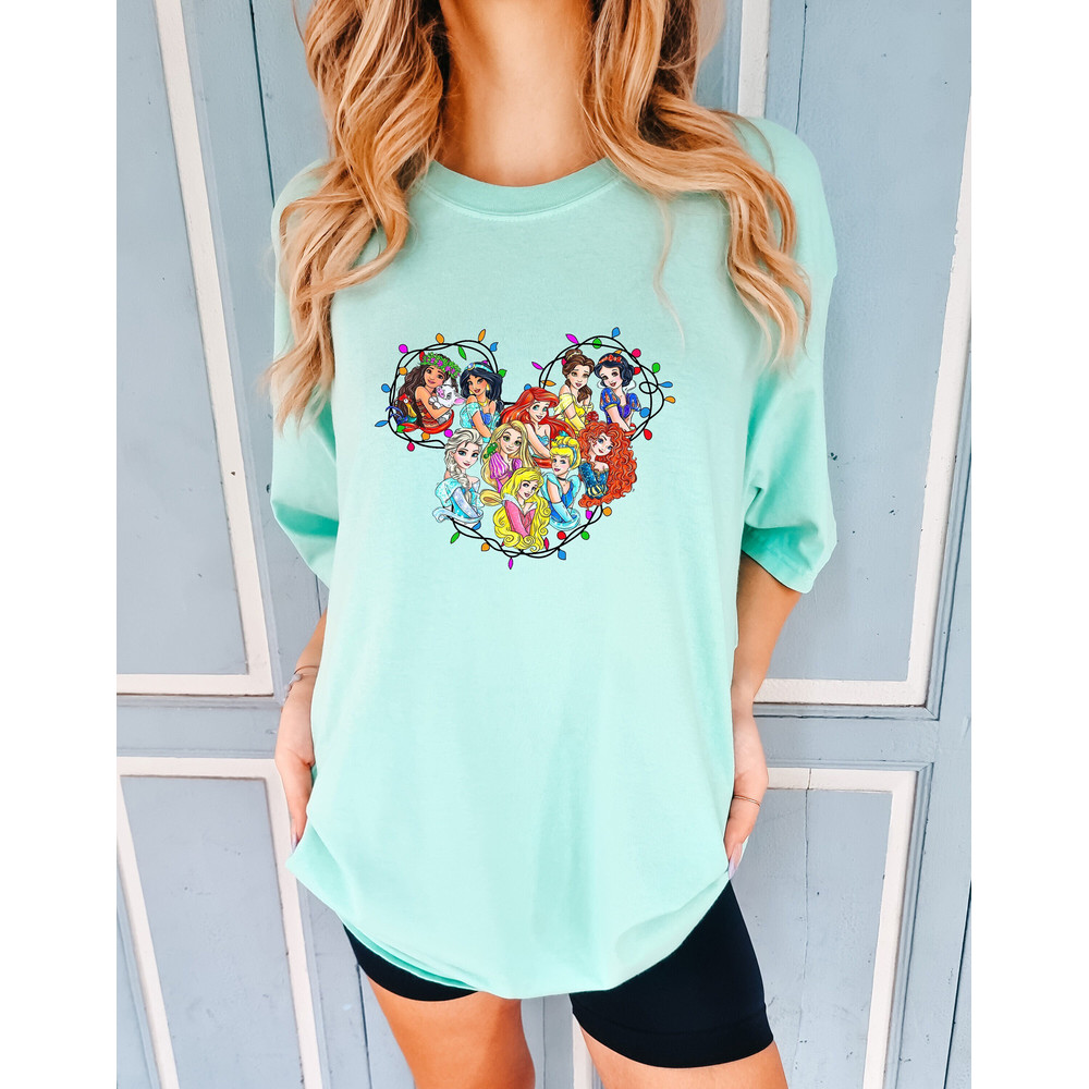 Disney Princess Christmas Lights Comfort colors Shirt, Disney Cute Shirt, Disney Princesses Mickey Ears Shirt, Disney Christmas Watercolor.jpg