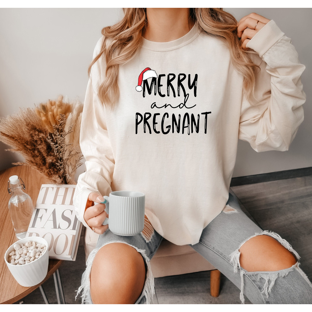 Merry and Pregnant Comfort colors Shirt, Pregnancy Announcement Shirt, Pregnant Christmas Shirt, Funny Pregnant Shirt, Christmas Gift For te.jpg