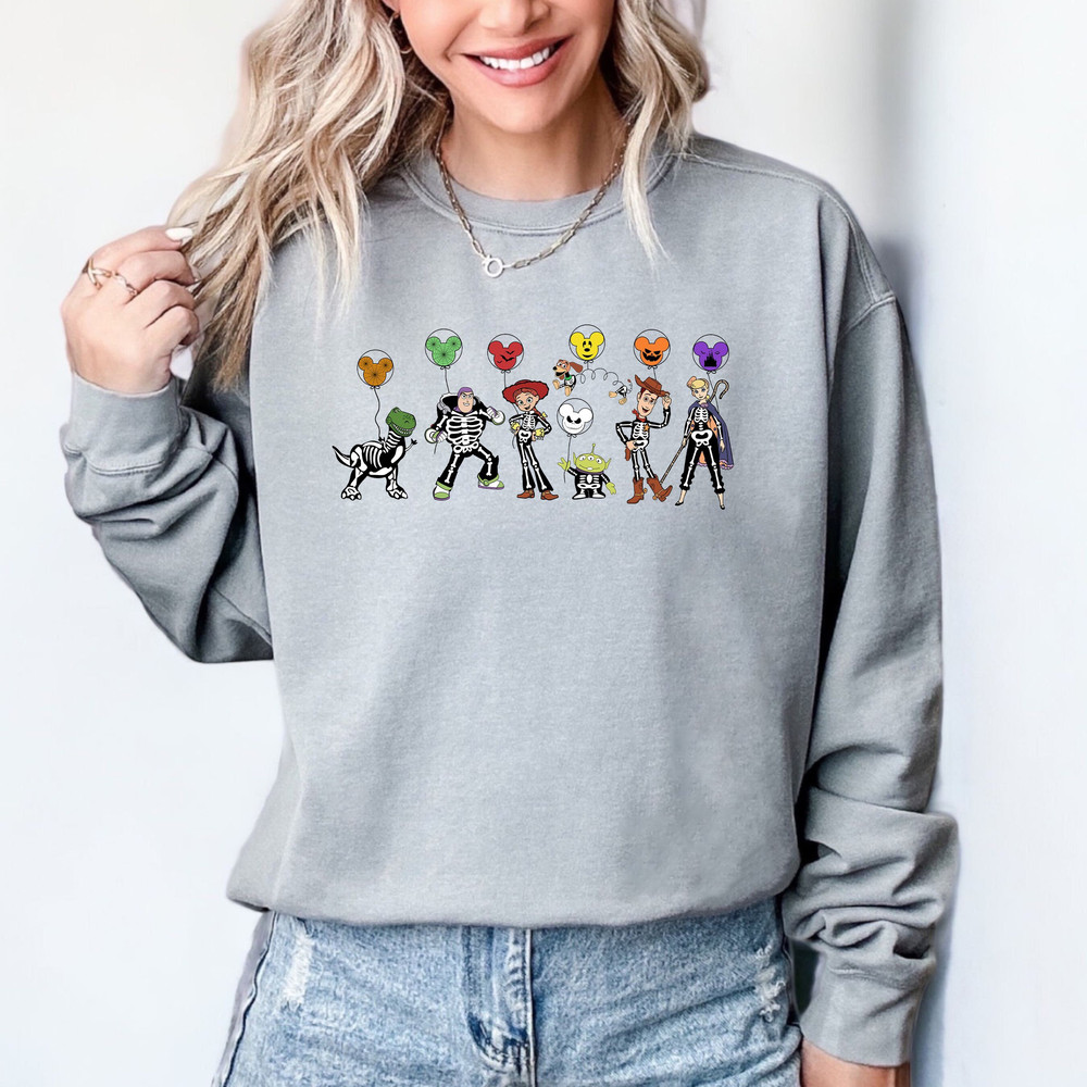 Toy Story Skeletons Halloween Comfort colors Shirt, Disney Skeleton Jessie,Woody Halloween Tee, Disney Halloween Shirt, Disney Movie Shirt,.jpg
