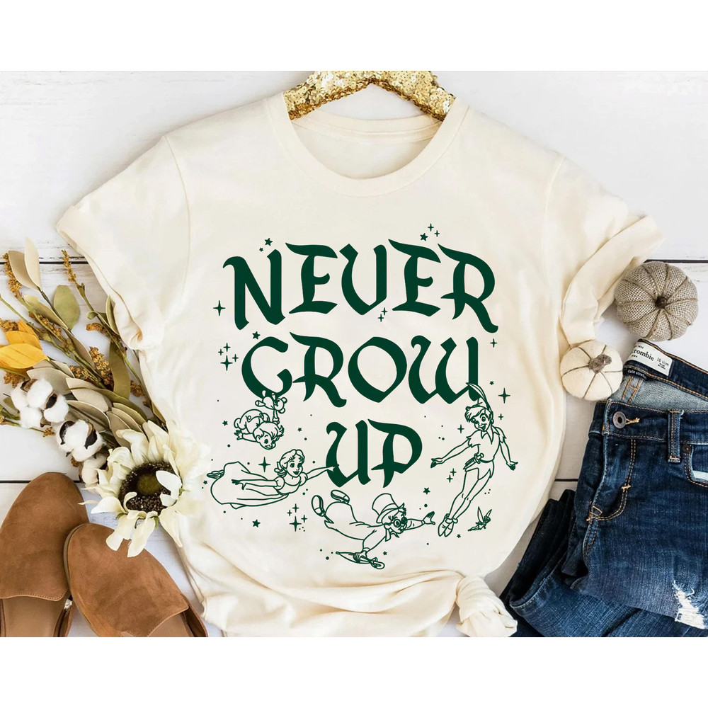 Disney Peter Pan Never Grow Up Flying Cast Graphic Shirt, Magic Kingdom Holiday Unisex T-shirt Family Birthday Gift Adult Kid Toddler Tee.jpg