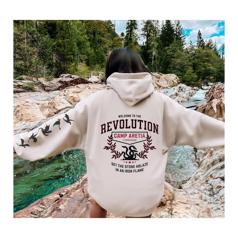 Iron Flame Revolution Hoodie with sleeve dragons, welcome to the revolution on back with left sleeve dragons, Iron FlameFourth Wing fans.jpg