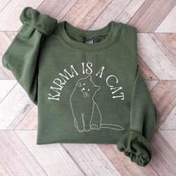 karma is a cat inspired sweatshirt, swiftie karma sweatshirt, taylor eras cat lovers shirt, tay