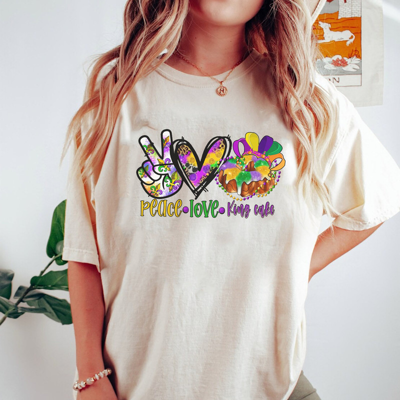 Peace Love King Cake Mardi Gras Shirt, Mardi Gras Shirt, Peace Shirt, Mardi Gras Tee, Mardi Gras Sweatshirt, Love Shirt, King Cake Shirt.jpg