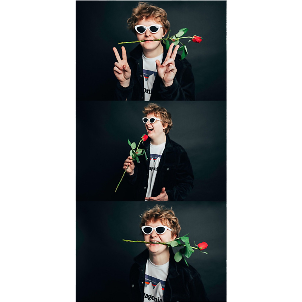 Lewis Capaldi with a rose .png