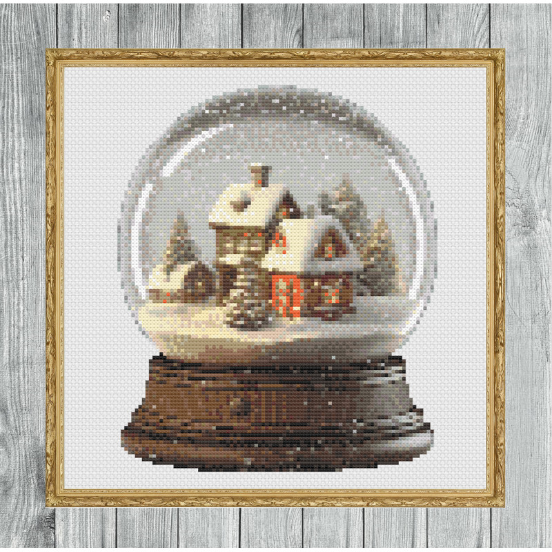 Snow Covered Village Snow Globe Cross Stitch Gold Frame.jpg