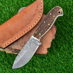 custom handmade damascus steel skinning knife with stag horn handle and leather sheath