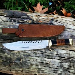 crocodile dundee bowie knife with brass guard and buffalo horn handle, premium leather sheath included