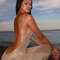 Kliou Women's Shiny Long Dress, Stunning Sleeveless Bodycon with Sheer Mesh & Backless Design for Elegant Summer Fashion
