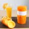 FreshPress Manual Citrus Juicer Cup with Measuring Scale and Lemon Squeezer