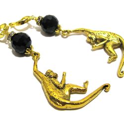 Long earrings with big black agate beads and golden monkey charms