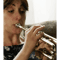 EASTENDERS LEGENDS SONIA WITH A TRUMPET.png