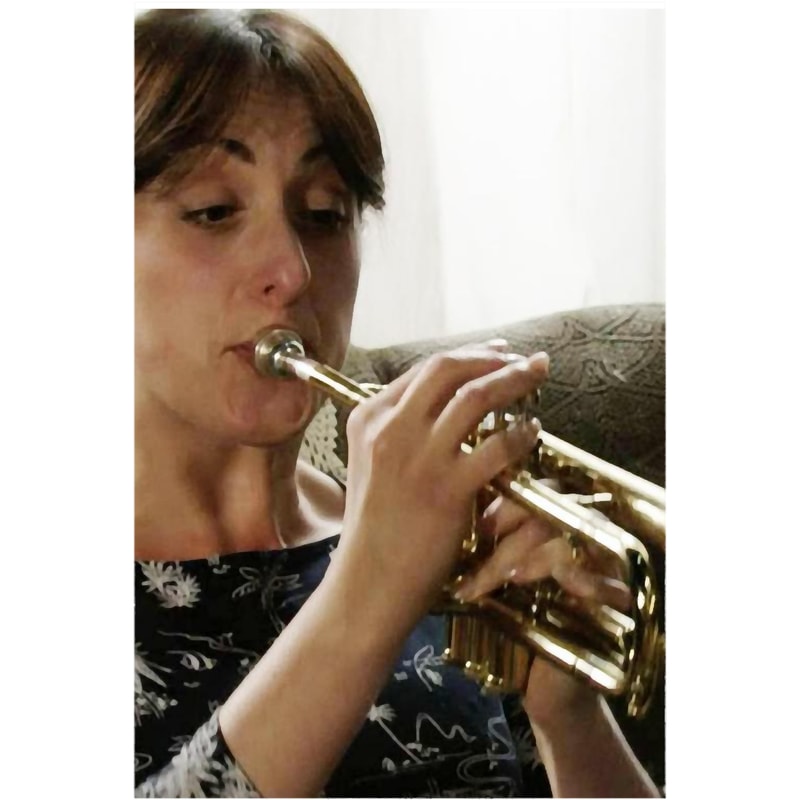 EASTENDERS LEGENDS SONIA WITH A TRUMPET.png