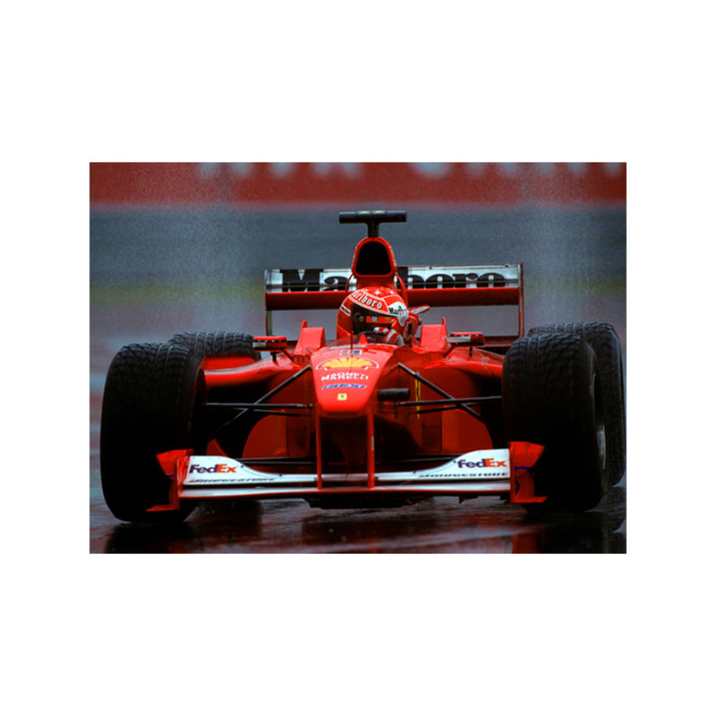 Michael Schumacher racing in the rain during the 2000 Canadian Grand Prix .png