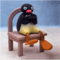 Very Angy Pingu Sitting On A Chair .png