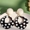 A Pair of Black and White large Polka Dot Hollow Geometric Shape Nostalgia Harbor Wind Earrings