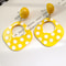 A Pair of Black and White large Polka Dot Hollow Geometric Shape Nostalgia Harbor Wind Earrings