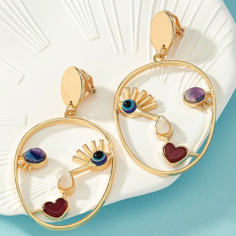 Goldcolor Hollow Geometric Evil Eye Beads Dangle Earrings Creative Abstract Face Pendant For Women 1