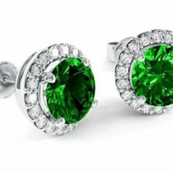 sterling silver round lab created emerald and white topaz halo stud earrings