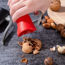 ergonomic nut cracker and sheller tool for walnut & pecan bottle style