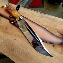 steel bowie knife with engraved bone handle with leather sheath...hand made high polish viking collectibles beautiful.