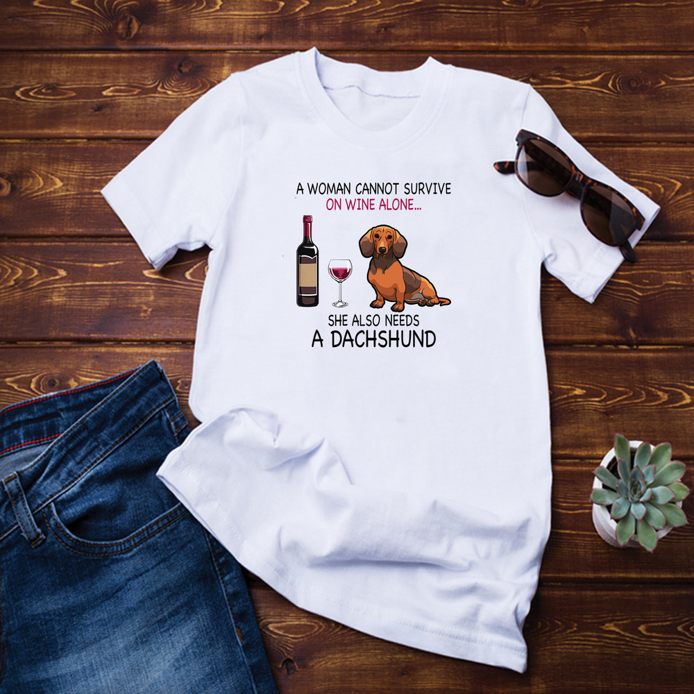 A Woman Cannot Survive On Wine shirt.png