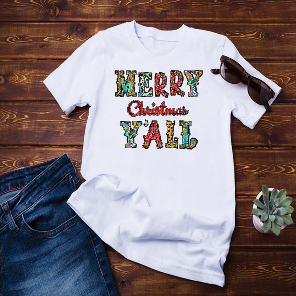 Western Country Cowhide Turquoise Rodeo Merry Christmas Y'll T-Shirt.png