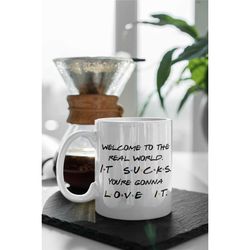 welcome to the real world, it sucks you gonna love it friends design tv show friends 11 oz ceramic mug gift birthday gif