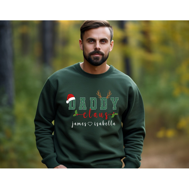 Custom Christmas Daddy Sweatshirt with Kids Name Personalized Dada Claus Shirt Xmas Gift for Dad Family Claus Tee.jpg