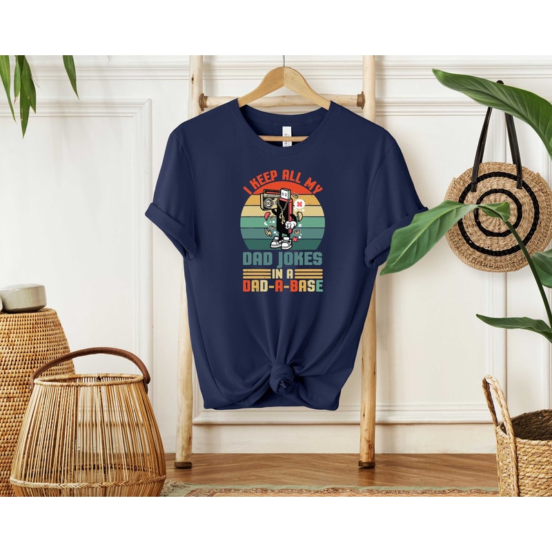 I Keep All My Dad Jokes In A Dad A Base Shirt.jpg