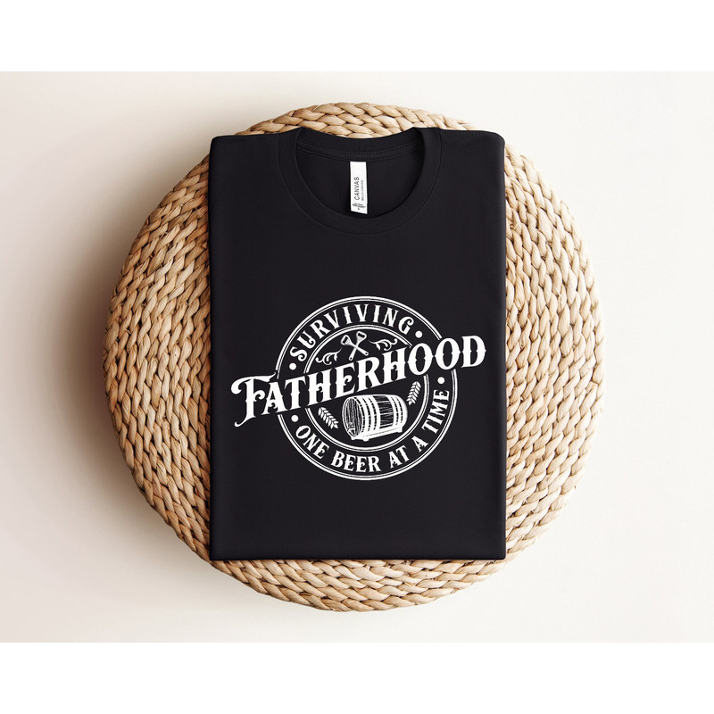 Surviving Fatherhood one Beer at a Time Shirt, Funny Dad Shirt, Dad Life Tee, Birthday Dad Gift, Sarcastic Shirt, Fathers Day Gift.jpg