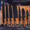 Forged Chef Knife Set With Wooden Handles Dark Finish Blades And Portable Roll Bag 2