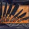 Forged Chef Knife Set With Wooden Handles Dark Finish Blades And Portable Roll Bag 4