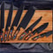 Forged Chef Knife Set With Wooden Handles Dark Finish Blades And Portable Roll Bag 4