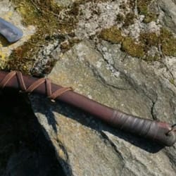 norse inspired carbon steel axe with rosewood handle