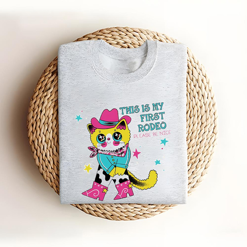 Cowboy Cat This Is My First Rodeo Please Be Nice Shirt .jpg