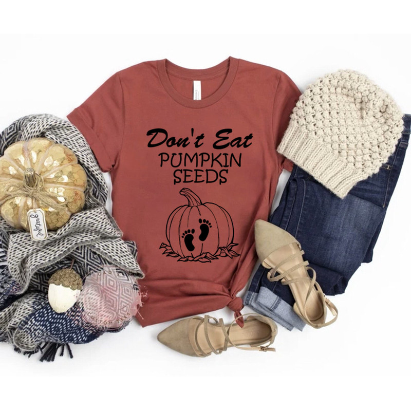 Don't Eat Pumpkin Seeds Shirt, Halloween Pregnancy Reveal, Halloween Pregnancy Shirt, Halloween Maternity Shirt, Pumpkin Pregnancy Shirt.jpg