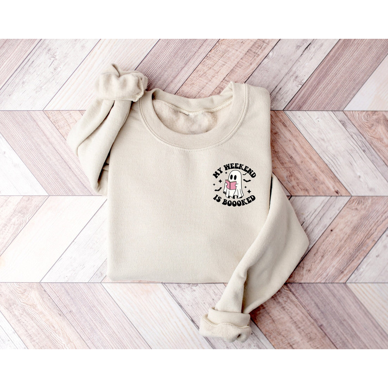 My Weekend is Booked Halloween Ghost Pocket Size Sweatshirt,Teacher Halloween Shirt,Book Lovers,Halloween School Tee,Halloween Reading Shirt.jpg