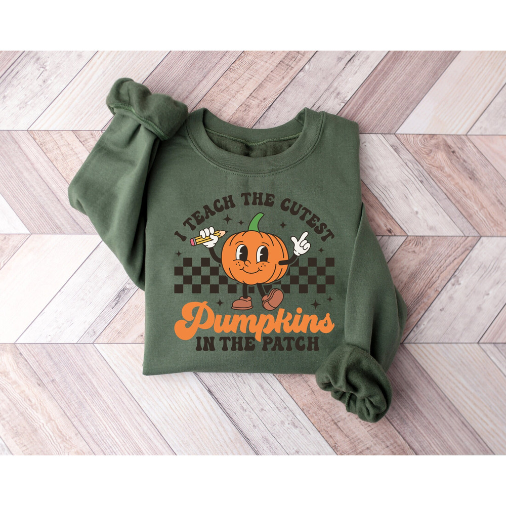 I Teach The Cutest Pumpkins In The Patch Shirt Sweatshirt, Halloween Shirt, Teacher Shirt, Pumpkin Teacher Shirt, Cute Teacher Tee.jpg